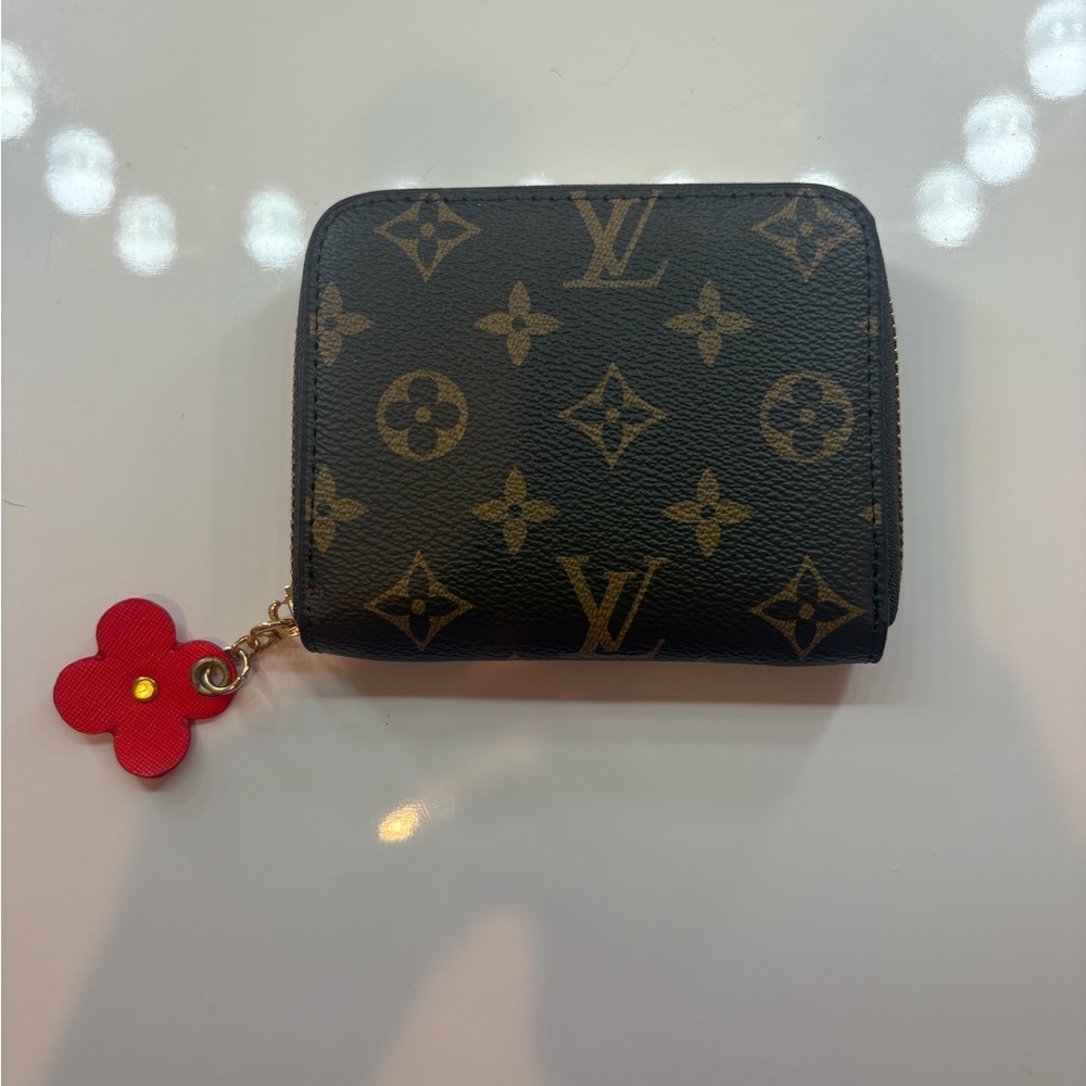 Louis Vuitton Black and Gold Monogram Wallet with Red Charm
